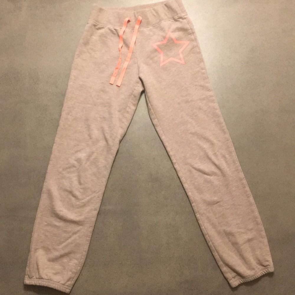 Tan sweat paints with coral